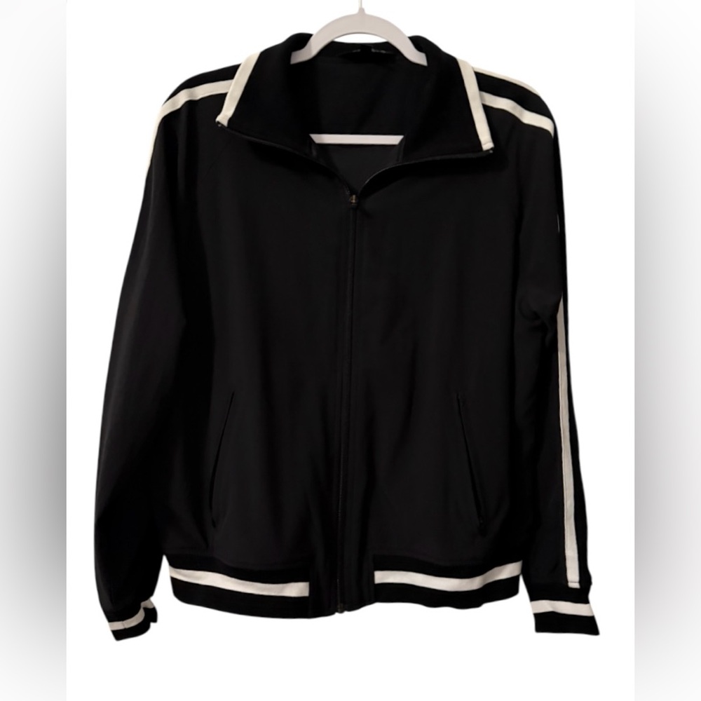 Athleta women’s Medium long sleeve full
zip striped black & white track jacket